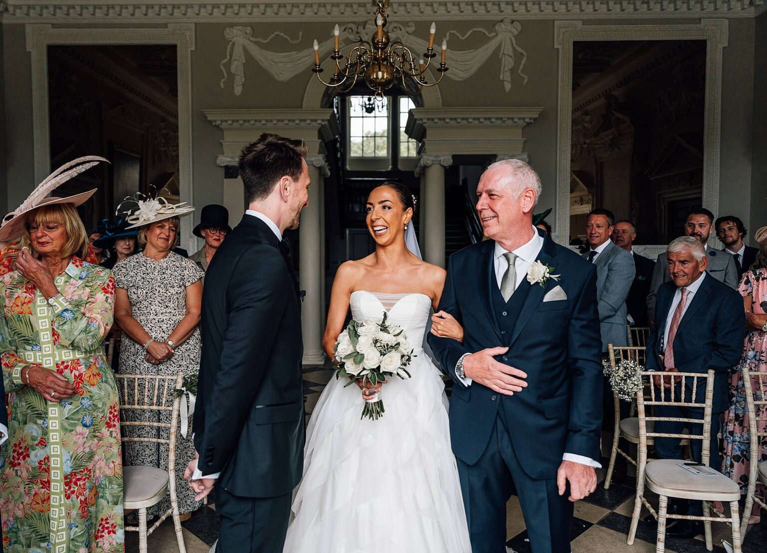 Bride walks down the aisle with her dad at Crowcombe Hall
